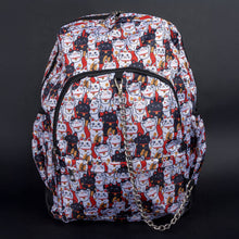 Load image into Gallery viewer, A gothic-inspired backpack by CHOK GothX featuring a vibrant lucky cat print in white, black, orange, and red. Includes a silver chain detail, multiple zip compartments, and a spacious design. Perfect for alternative fashion lovers.