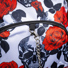 Load image into Gallery viewer, Close-up of front pocket with skull, red rose, and chain detail – Detailed view of the front pocket, showing a black and white skull pattern with bold red roses and a silver chain detail, enhancing the gothic look.