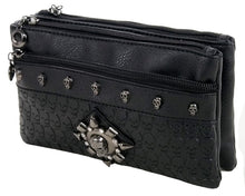 Load image into Gallery viewer, The gothx black skull vegan clutch bag on a white studio background. The clutch is facing forward angled left to highlight the skull embossed vegan black leather, the crystal stud skull centrepiece, zip pocket, two zip compartments and skull studs.