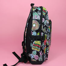 Load image into Gallery viewer, The kawaii graffiti doodle vegan backpack sat on a pink studio background. The bag is facing right to highlight the elastic side pockets. The all over print has lollipops, pugs, rainbows, pizzas, polaroid cameras, eyes and fries.