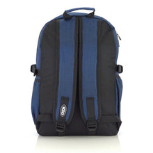 Load image into Gallery viewer, The CHOK Blue Commuter Vegan Backpack on a white studio background. The dark grey blue canvas bag is facing away from the camera to highlight the elastic side pockets, adjustable shoulder straps, top handle and chok logo on the left strap.