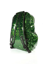 Load image into Gallery viewer, The CHOK Green Holographic Hive Vegan Backpack on a white background. The bag is facing away angled to the right to highlight the 3d holographic honeycomb effect, 2 padded adjustable shoulder straps, 2 elastic side pockets and the CHOK logo on the left strap.