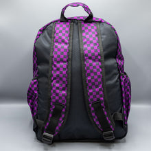 Load image into Gallery viewer, The Purple Checkerboard Backpack sat on a grey background. The vegan friendly bag is facing away from the camera to highlight the plain black back, the two side elasticated pockets, the top handle and the two adjustable padded shoulder straps.
