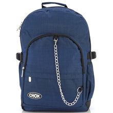 Load image into Gallery viewer, The CHOK Blue Commuter Vegan Backpack on a white studio background. The dark grey blue canvas bag is facing forward to highlight the two front zip pockets, elastic side pockets, detachable silver chain and chok logo.