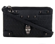 Load image into Gallery viewer, The gothx crystal skull vegan clutch bag in front of a white studio background. The bag is facing forward to highlight the embossed skull vegan black leather, mini skull studs, two main zip compartments, detachable shoulder strap and crystal skull centrepiece.