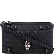 Load image into Gallery viewer, The gothx crystal skull vegan clutch bag in front of a white studio background. The bag is facing forward to highlight the embossed skull vegan black leather, mini skull studs, two main zip compartments, detachable shoulder strap and crystal skull centrepiece. 
