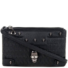 Load image into Gallery viewer, The gothx crystal skull vegan clutch bag in front of a white studio background. The bag is facing forward to highlight the embossed skull vegan black leather, mini skull studs, two main zip compartments, detachable shoulder strap and crystal skull centrepiece.