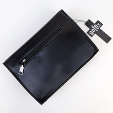 Load image into Gallery viewer, The GothX Ouija Spirit Book Mini Bag laying on its front on a white background to show the zip back pocket and plain black vegan leather back.
