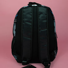 Load image into Gallery viewer, The retro black 80s stereo vegan backpack on a pink background. The bag is facing away to highlight the plain black back, two side pockets, top handle and padded adjustable shoulder straps.