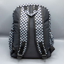 Load image into Gallery viewer, The Grey Checkerboard Backpack sat on a grey background. The vegan friendly bag is facing away from the camera to highlight the plain black back, the two side elasticated pockets, the top handle and the two adjustable padded shoulder straps.
