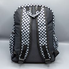 Load image into Gallery viewer, The Grey Checkerboard Backpack sat on a grey background. The vegan friendly bag is facing away from the camera to highlight the plain black back, the two side elasticated pockets, the top handle and the two adjustable padded shoulder straps.