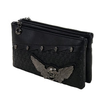 Load image into Gallery viewer, The Gothx winged skull vegan clutch bag on a white studio background. The vegan black leather bag is facing forward angled left to highlight the embossed skull leather, mini skull studs, detachable wrist strap and metal winged skull centrepiece.

