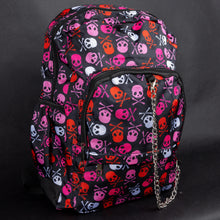 Load image into Gallery viewer, Side view of the CHOK GothX backpack, highlighting bold pink skulls and crossbones in pink, red, and white. Designed for durability and comfort, it features side pockets, padded straps, and edgy chain details. Perfect for alternative fashion enthusiasts.
