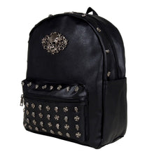 Load image into Gallery viewer, The GothX Skulls and Roses Vegan Backpack shot in front of a white studio background. The bag is angled forward to the left. The black backpack has silver skull and cross studs along the front zip pocket and a rose skull emblem in the middle.
