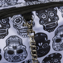 Load image into Gallery viewer, Close-up of the silver chain detail and black sugar skull print on a white gothic backpack by CHOK GothX. The intricate pattern and quality materials reflect the brand&#39;s alternative style for bold fashion lovers.
