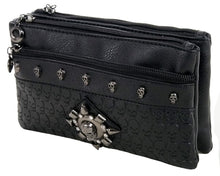 Load image into Gallery viewer, The gothx black skull vegan clutch bag on a white studio background. The clutch is facing forward angled left to highlight the skull embossed vegan black leather, the crystal stud skull centrepiece, zip pocket, two zip compartments and skull studs.
