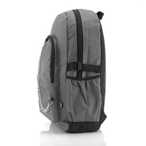 The CHOK Grey Commuter Vegan Backpack on a white studio background. The light grey canvas bag is facing left to highlight the two front zip pockets, elastic side pockets, detachable silver chain and chok logo.