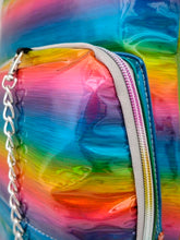 Load image into Gallery viewer, Close up of the CHOK rainbow holographic vegan backpack rainbow zip and silver chain detailing.
