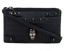 Load image into Gallery viewer, The gothx crystal skull vegan clutch bag in front of a white studio background. The bag is facing forward to highlight the embossed skull vegan black leather, mini skull studs, two main zip compartments, detachable shoulder strap and crystal skull centrepiece.
