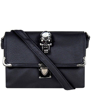 The GothX crystal skull vegan shoulder bag on a white studio background. The bag is facing forward to highlight the crystal skull centrepiece, metal clasp clip close, metal corner detailing and detachable strap.