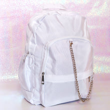 Load image into Gallery viewer, The white nylon vegan backpack with chain on an iridescent background. The bag is facing forward angled right to highlight the two front zip pockets, two side pockets, double zip main compartment, top handle and detachable silver chain.
